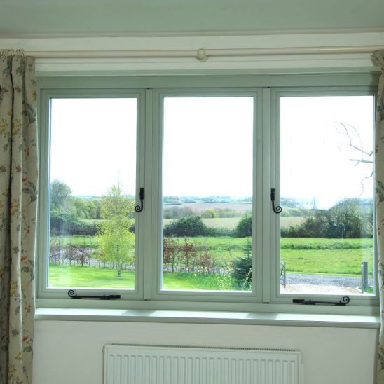 Timber cottage casement window with Monkeytail handle