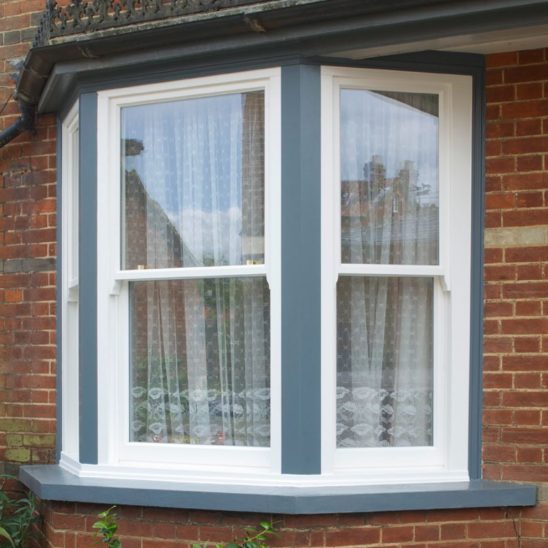 Traditional timber sash windows with complementary sash and frame colours in Woodbridge
