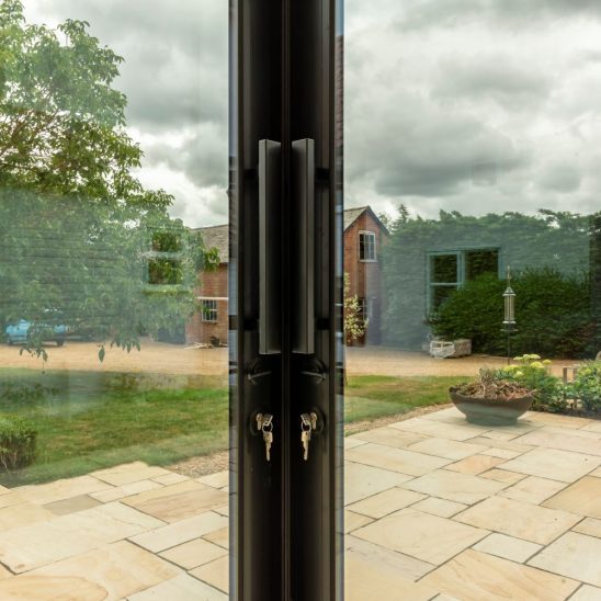 Sunflex sliding patio doors with stainless steel bar handles and multipoint locking