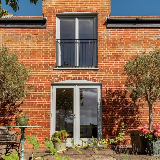 Timber French doors and windows in Window Grey on the outside and pure white on the inside