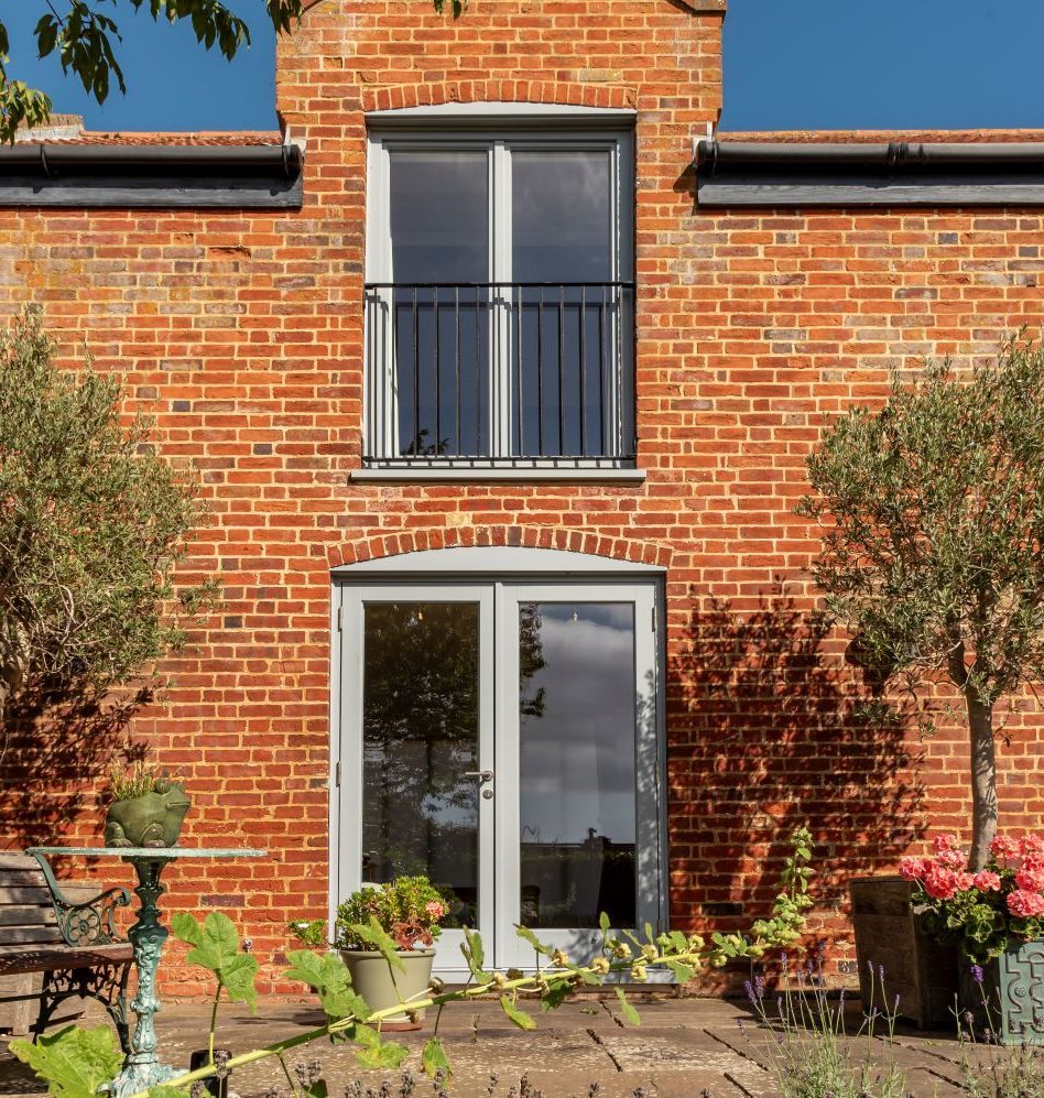 Timber French doors and windows in Window Grey on the outside and pure white on the inside