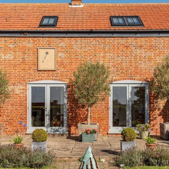 Timber French doors and windows in Window Grey on the outside and pure white on the inside