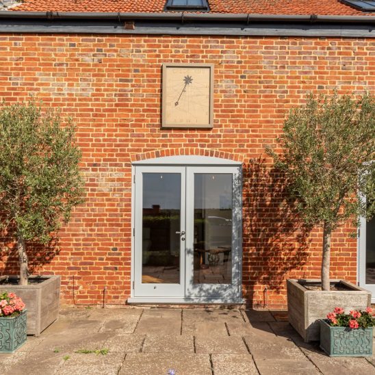 Timber French doors in Window Grey on the outside and pure white on the inside