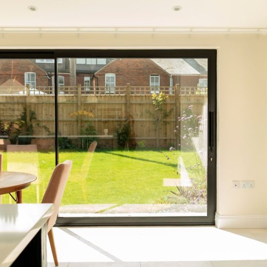 Sunflex SVG20 aluminium sliding doors in black, with super slim 20mm interlock