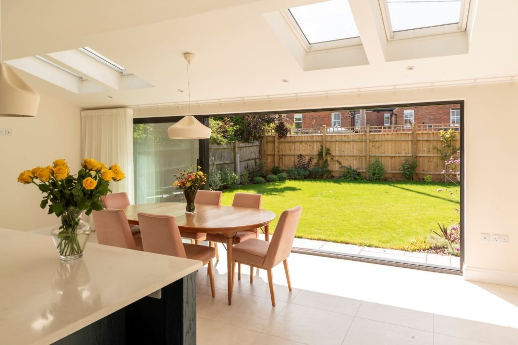 Sunflex black SVG20 aluminium ultra slim sliding doors at Aldeburgh home - open.