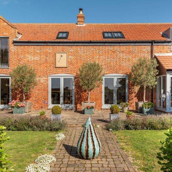 Timber French doors and windows in Window Grey on the outside and pure white on the inside