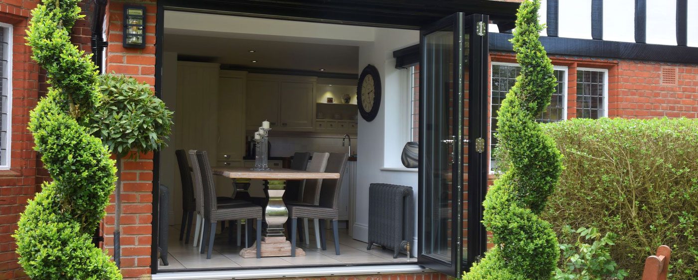 Timber bi-folding doors in black