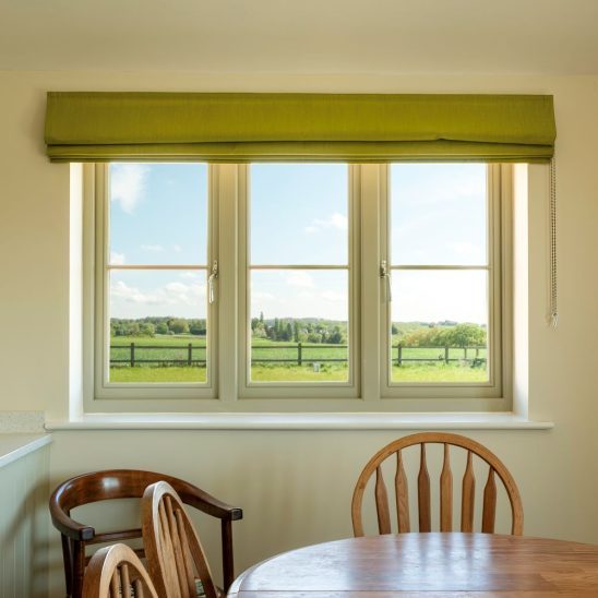 Thermally efficient timber flush casement windows in French grey with ovolo moulding