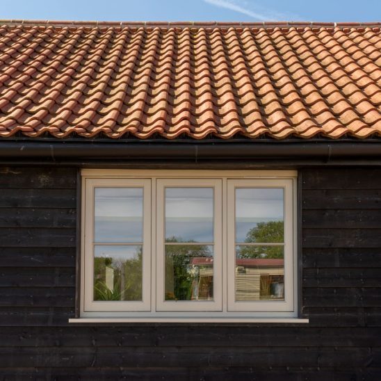 French grey redwood engineered timber flush casement windows, with ovolo moulding and 18mm astragal bars