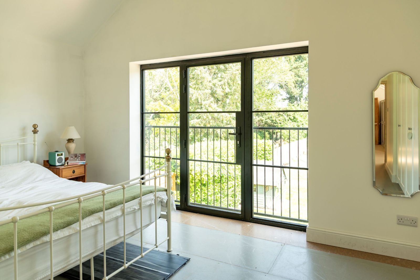 Aluco aluminium steel look French windows with side panels and super slim 20mm glazing bars in matt Black