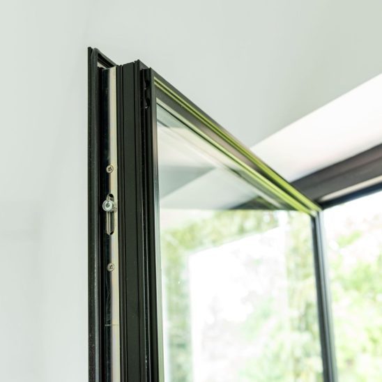 Aluco aluminium steel look French windows with side panels and super slim 20mm glazing bars in matt Black