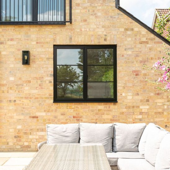 Aluco aluminium steel look window with super slim glazing bars in matt Black
