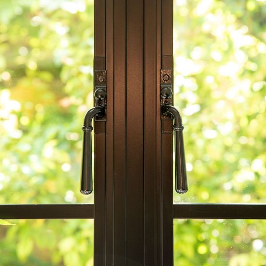 Aluco aluminium steel look window with super slim glazing bars in matt Black with Newbury handle