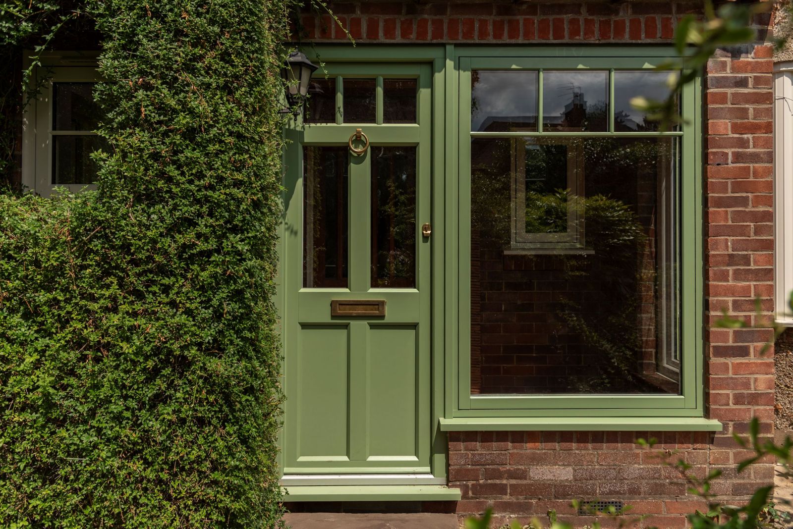 Vibrant steel look doors & Evolution front door elevate Cambridge home