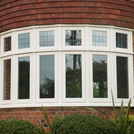 Engineered timber bay window with leaded lights