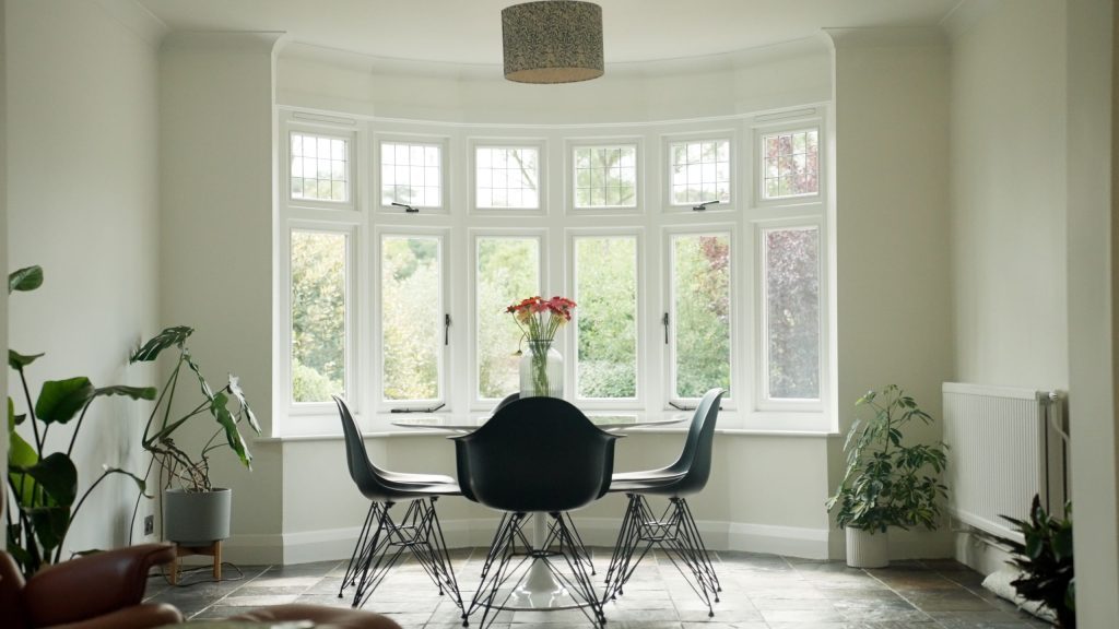 White engineered timber casement windows with leaded lights