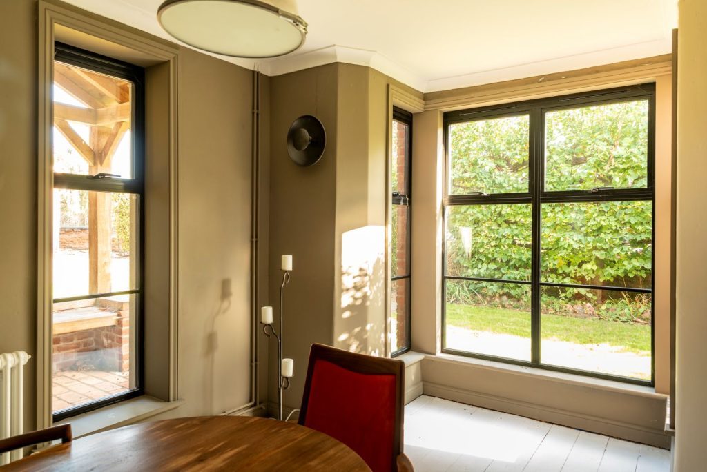 Black heritage, Art Deco aluminium windows with a top opener and super slim glazing bars