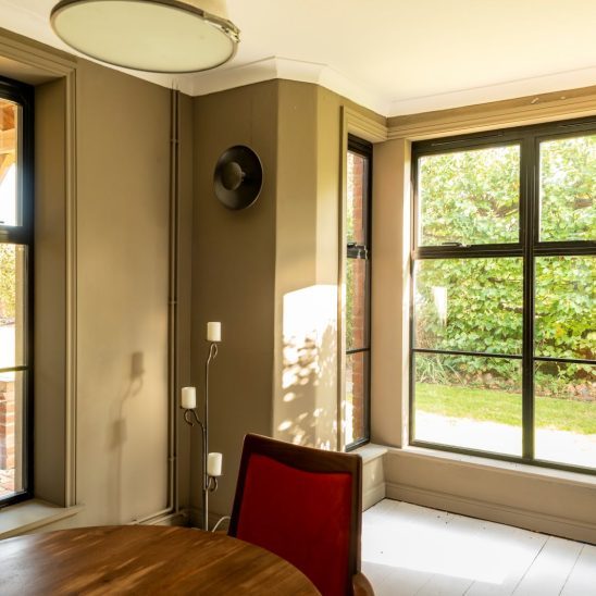 Black heritage, Art Deco aluminium windows with a top opener and super slim glazing bars