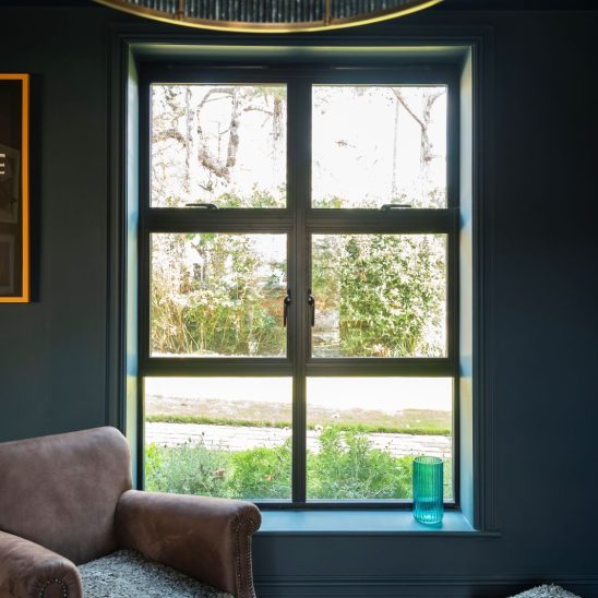 Black heritage, Art Deco aluminium windows with super slim glazing bars and a mix of top and side openings