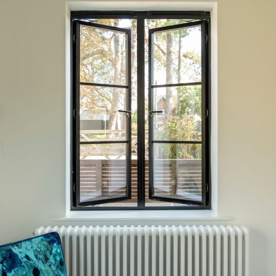 Aluco heritage aluminium windows with narrow glazing bars in matt black