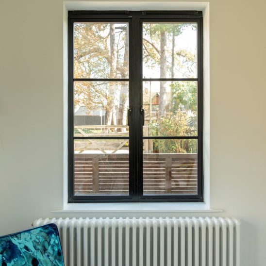 Aluco heritage aluminium windows with narrow glazing bars in matt black