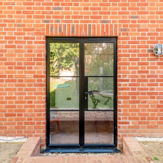 Black heritage, Art Deco aluminium patio doors with floating lock detail and Art Deco handle