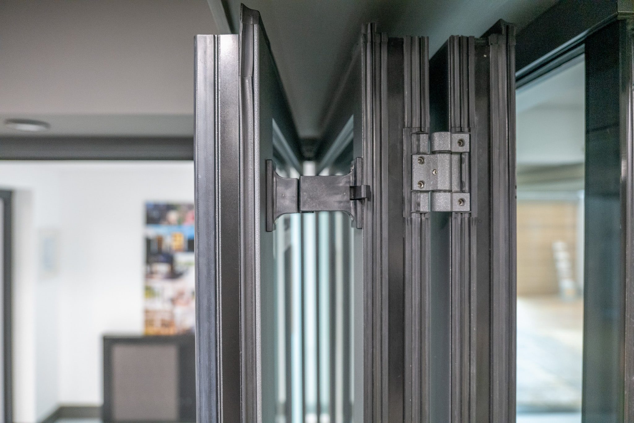 close up picture of bifold doors showing Sunflex panel catch
